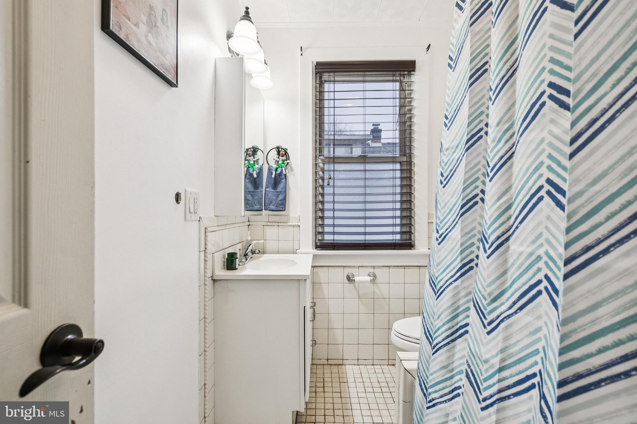 202 South Cedar Avenue Maple Shade, NJ 08052 - Photo 14 of 25 a bathroom with a sink and a mirror
