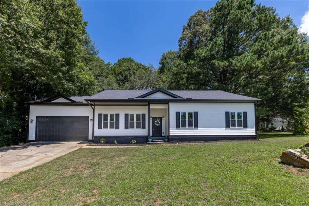 4502 Huntsman Bend Decatur, GA 30034 - Photo 1 of 1 a view of a house with a yard and sitting area