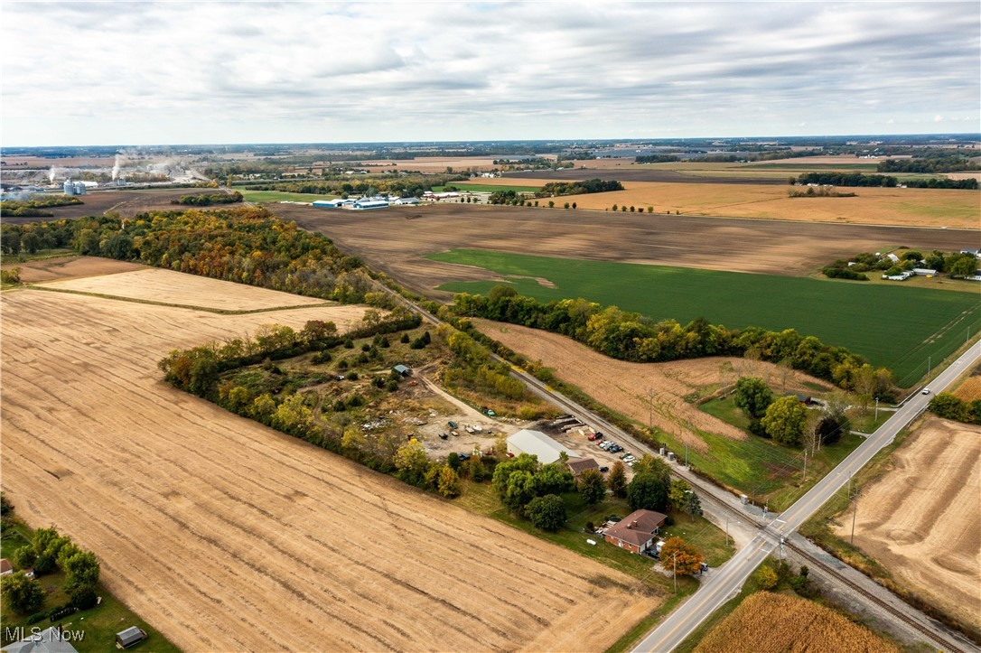 8802 West Mason Road Castalia, OH 44824 - Photo 49 of 49 Aerial view of sparsely populated area with rows of crops