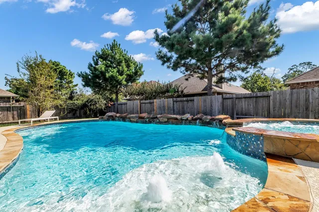 $440,000 | 14206 Rainier Peak Crossing, Conroe, TX 77384