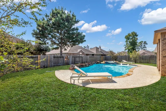 $440,000 | 14206 Rainier Peak Crossing, Conroe, TX 77384