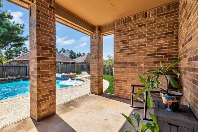 $440,000 | 14206 Rainier Peak Crossing, Conroe, TX 77384