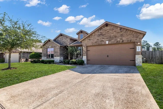 $440,000 | 14206 Rainier Peak Crossing, Conroe, TX 77384