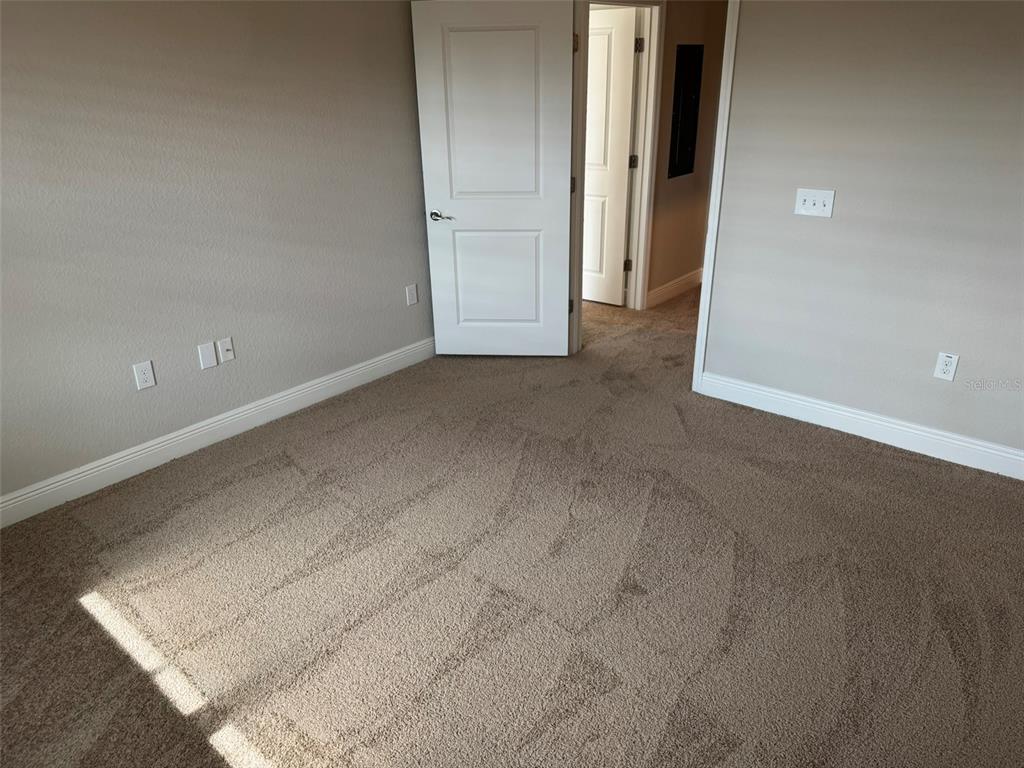 2420 Ann Rou Road, Unit 201 Tavares, FL 32778 - Photo 17 of 25 an empty room with an empty space