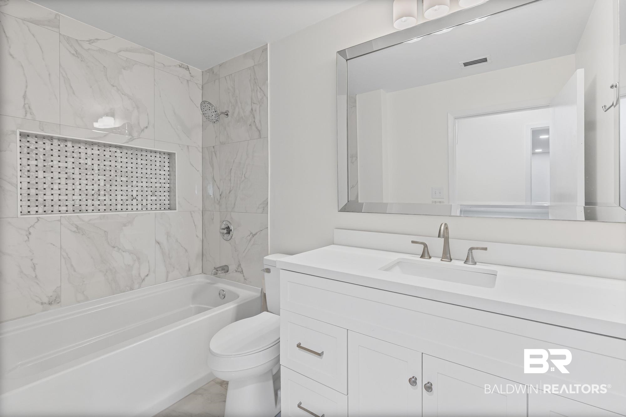 3041 Pretty Branch Drive East Mobile, AL 36618 - Photo 17 of 20 Full bath with bathtub / shower combination, vanity, and marble finish flooring