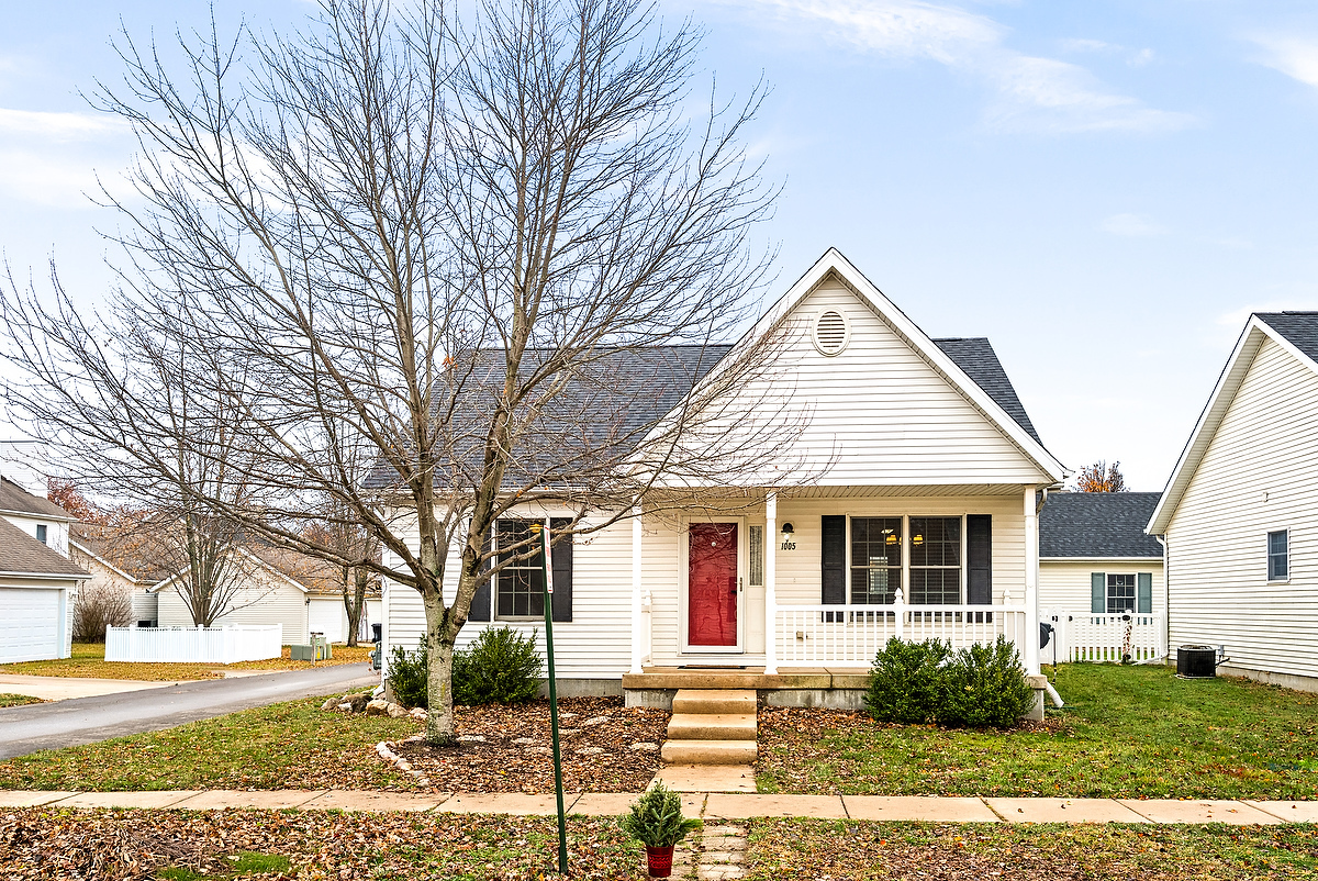 1005 Perry Lane Normal, IL 61761 - Photo 1 of 21 a front view of a house with garden