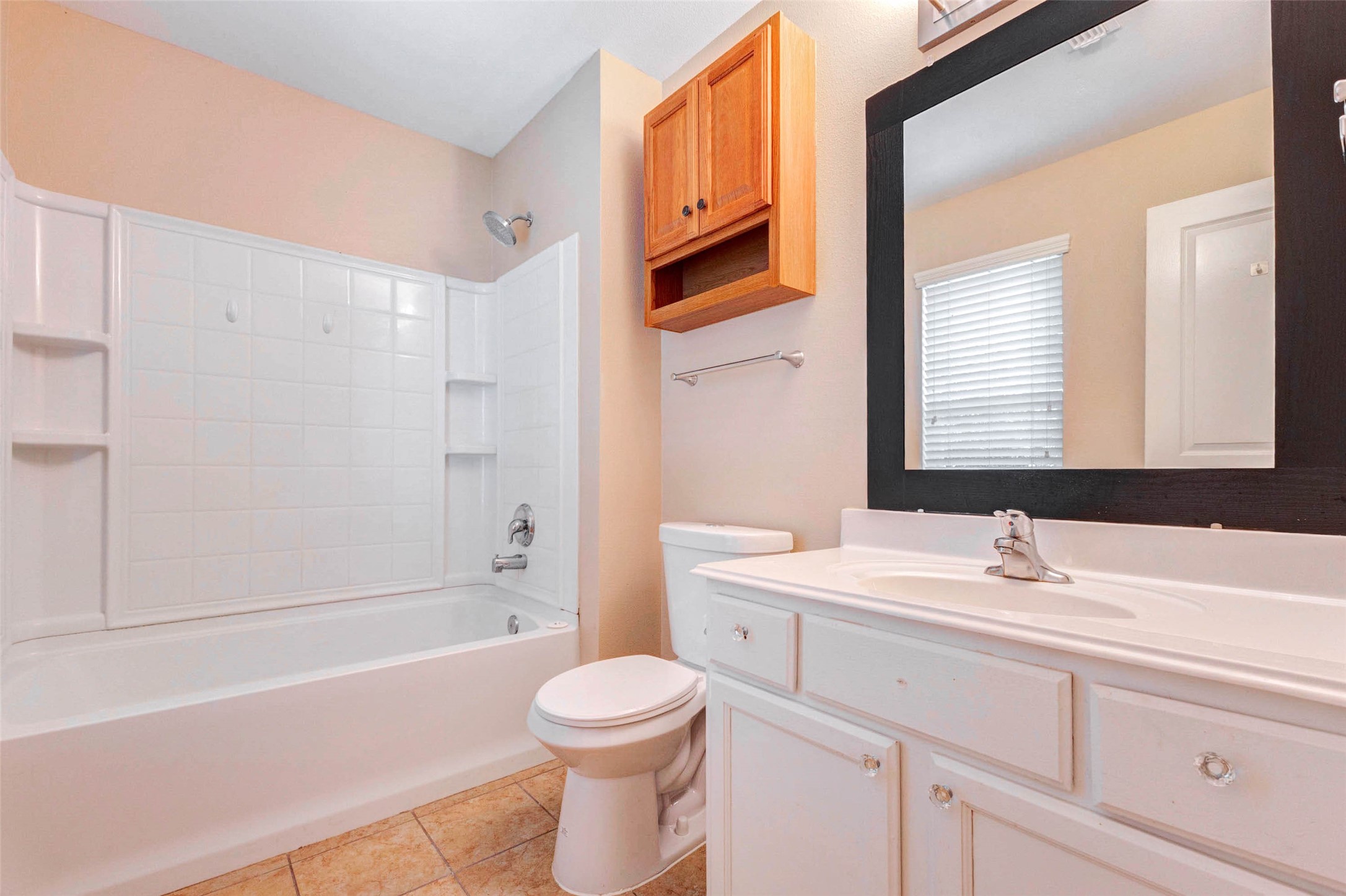 14522 Durham Chase Lane Houston, TX 77095 - Photo 28 of 40 a bathroom with a sink a toilet and shower