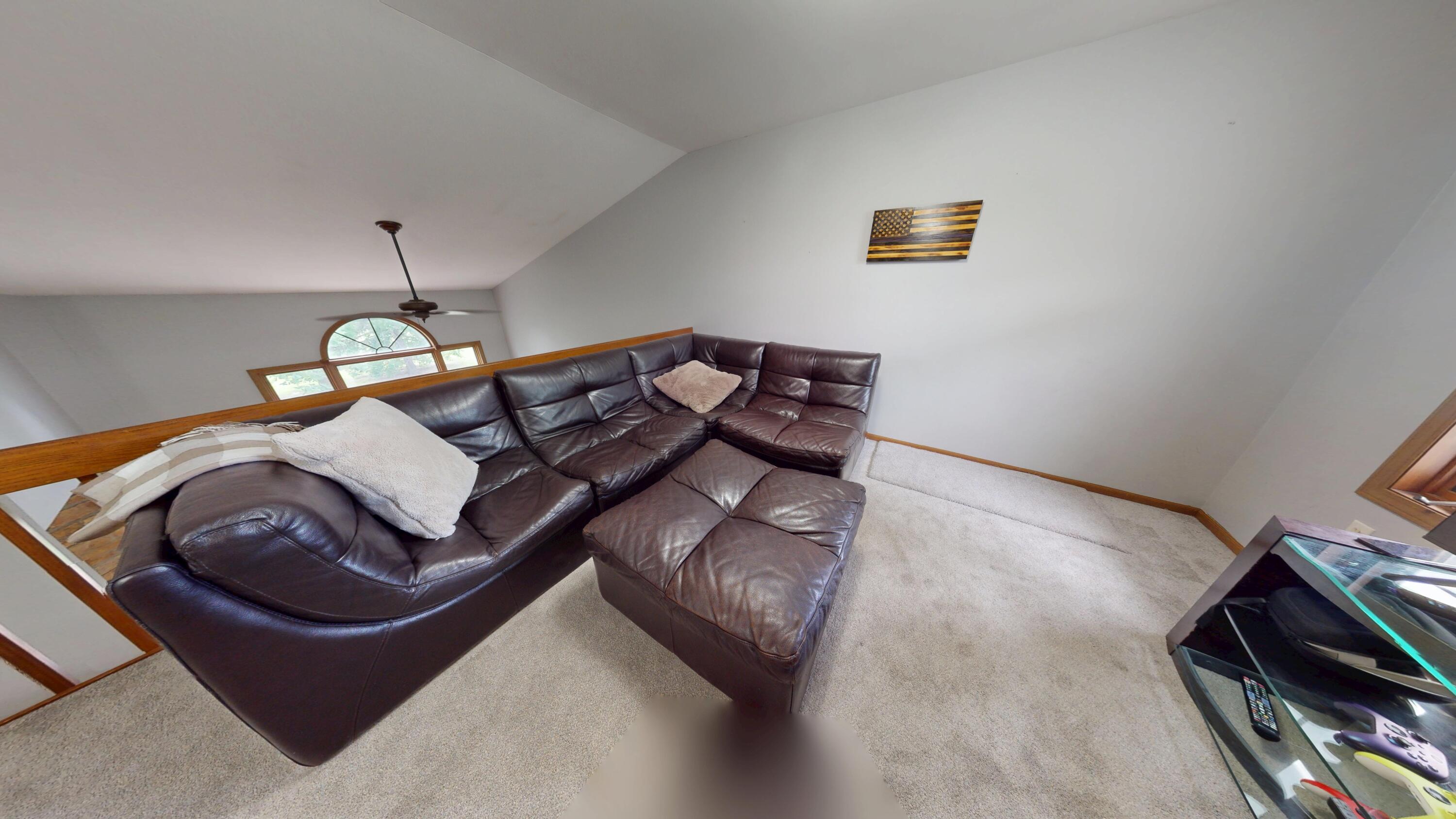 9344 Van Buren Street Crown Point, IN 46307 - Photo 21 of 37 a living room with furniture