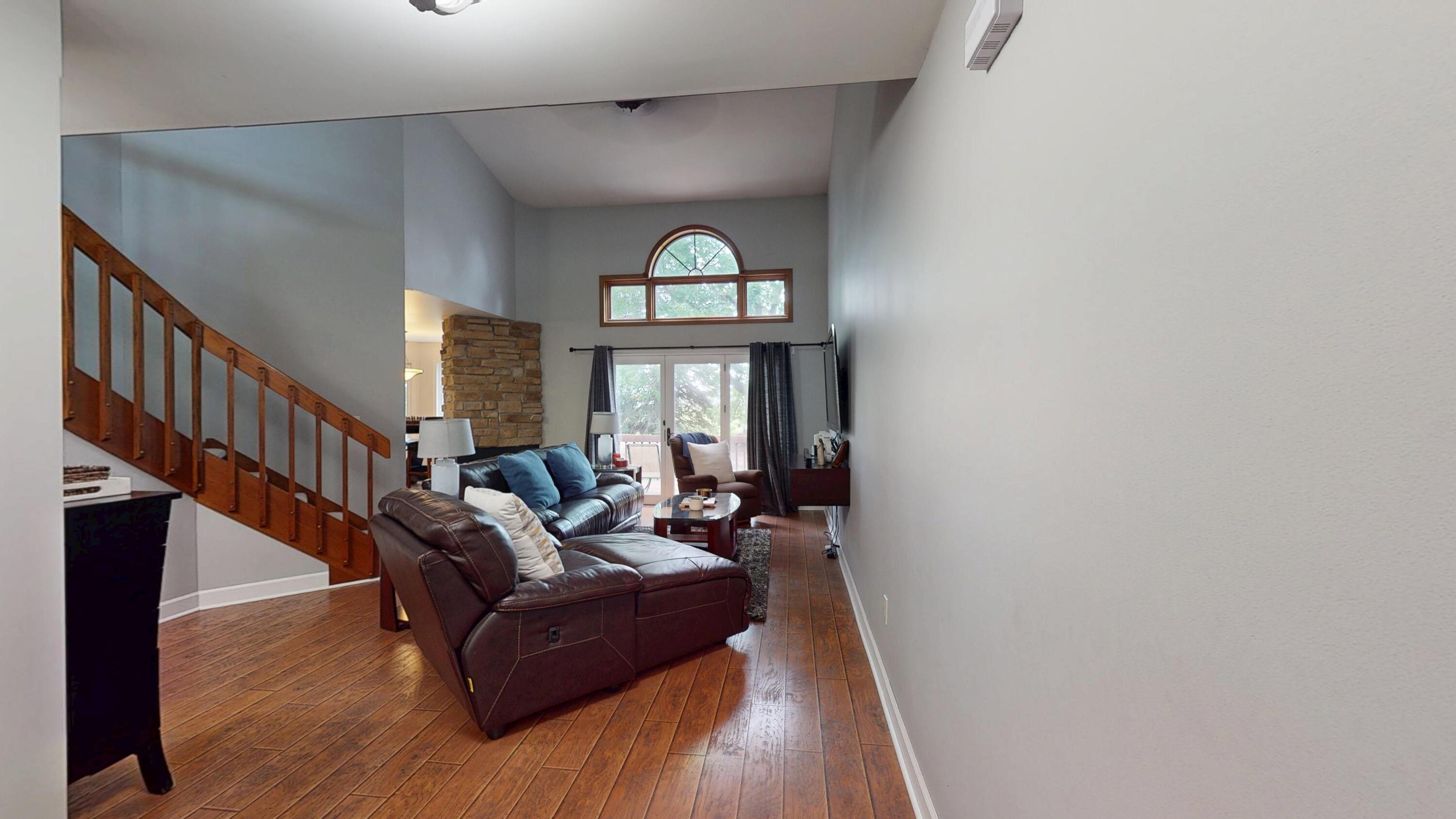 9344 Van Buren Street Crown Point, IN 46307 - Photo 4 of 37 a living room with furniture and a large window