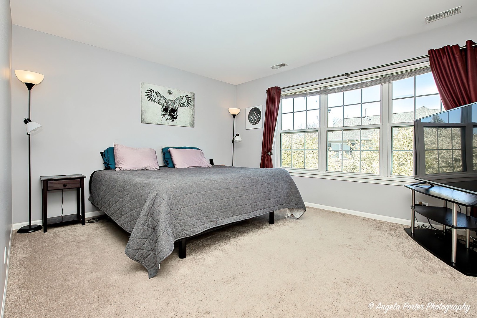 3012 Falling Waters Lane Lindenhurst, IL 60046 - Photo 12 of 21 a bedroom with a large bed and a window