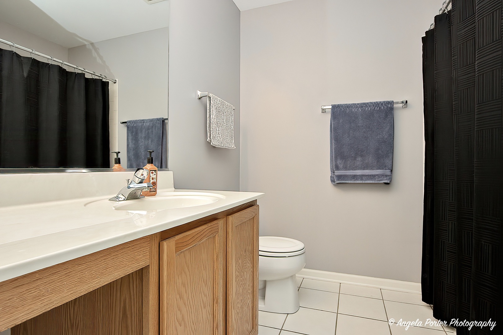 3012 Falling Waters Lane Lindenhurst, IL 60046 - Photo 13 of 21 a bathroom with a granite countertop sink toilet and mirror
