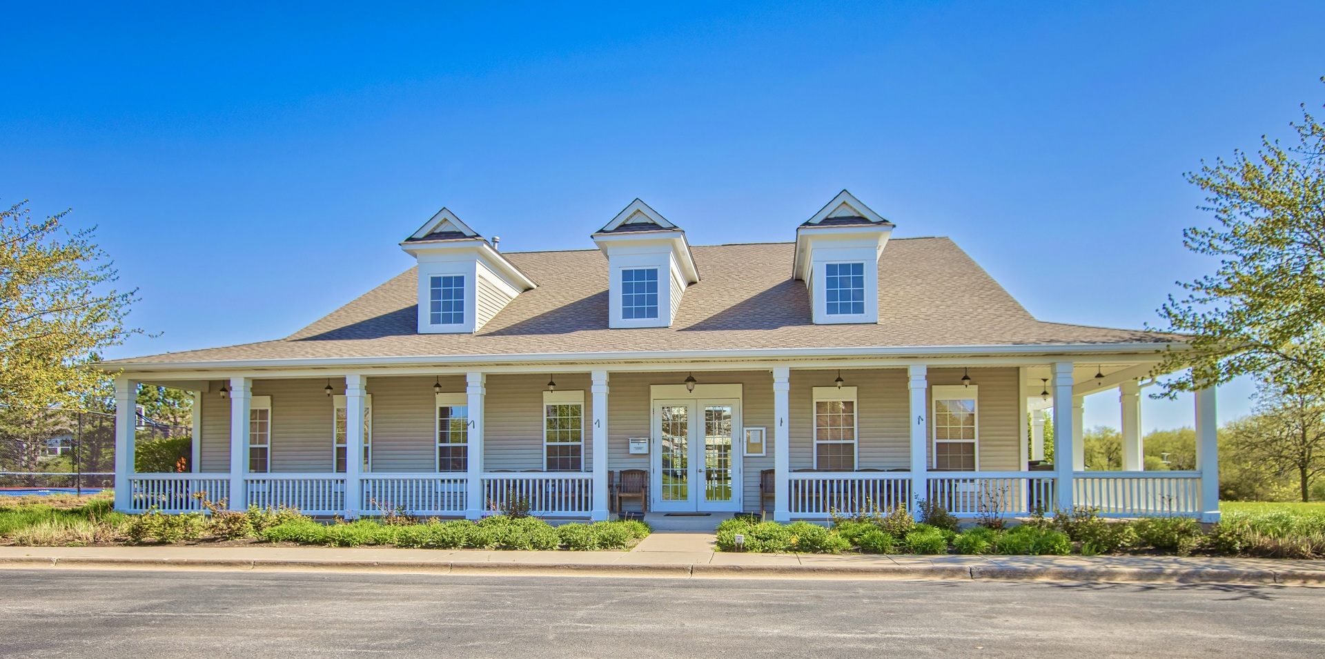3012 Falling Waters Lane Lindenhurst, IL 60046 - Photo 19 of 21 a front view of a building and a garden