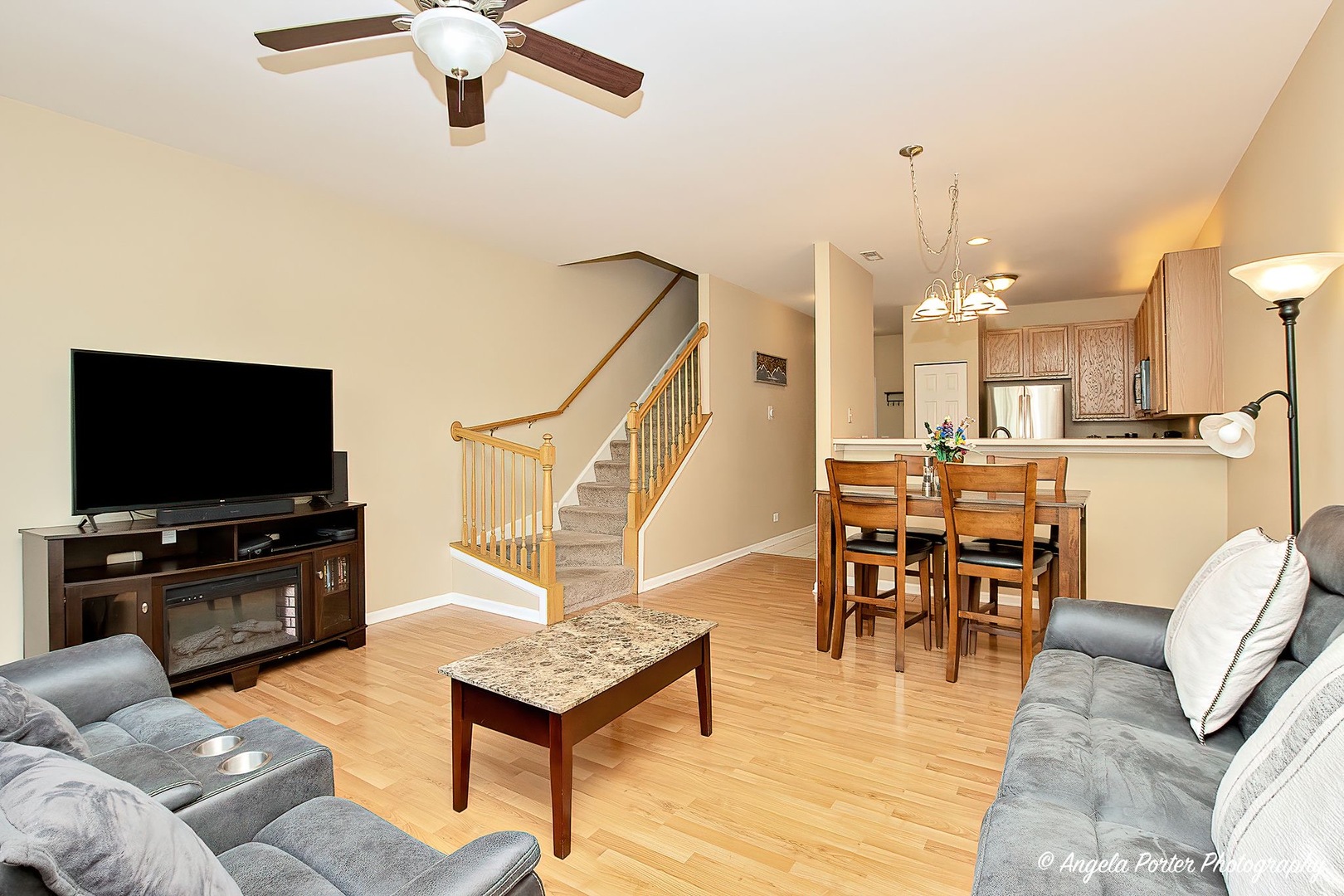 3012 Falling Waters Lane Lindenhurst, IL 60046 - Photo 8 of 21 a living room with furniture and a flat screen tv