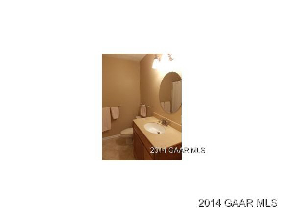468 Quick's Mill Road Verona, VA 24482 - Photo 18 of 24 a bathroom with a toilet sink and mirror