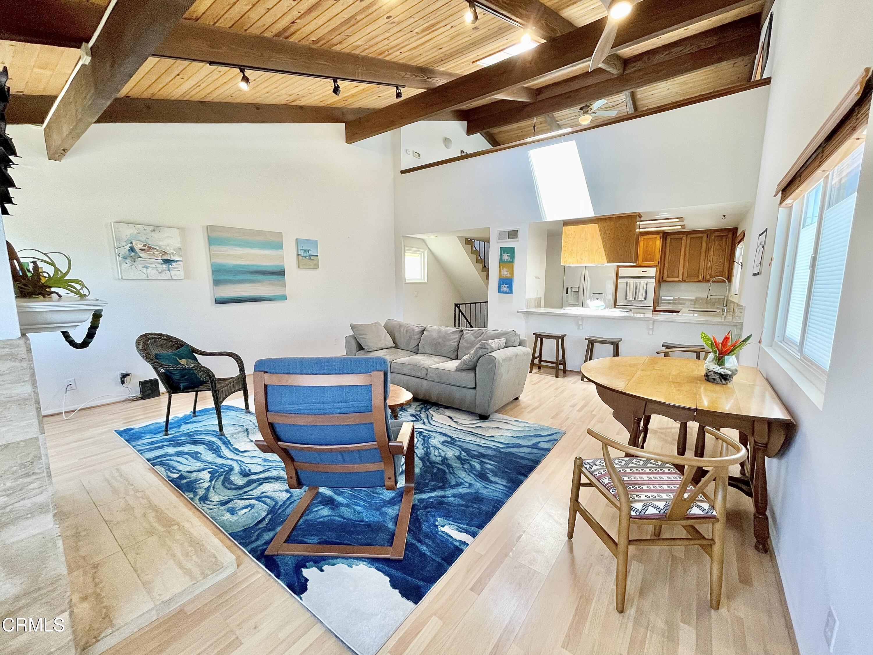 361 Rossmore Drive Oxnard, CA 93035 - Photo 5 of 26 a living room with furniture and a table