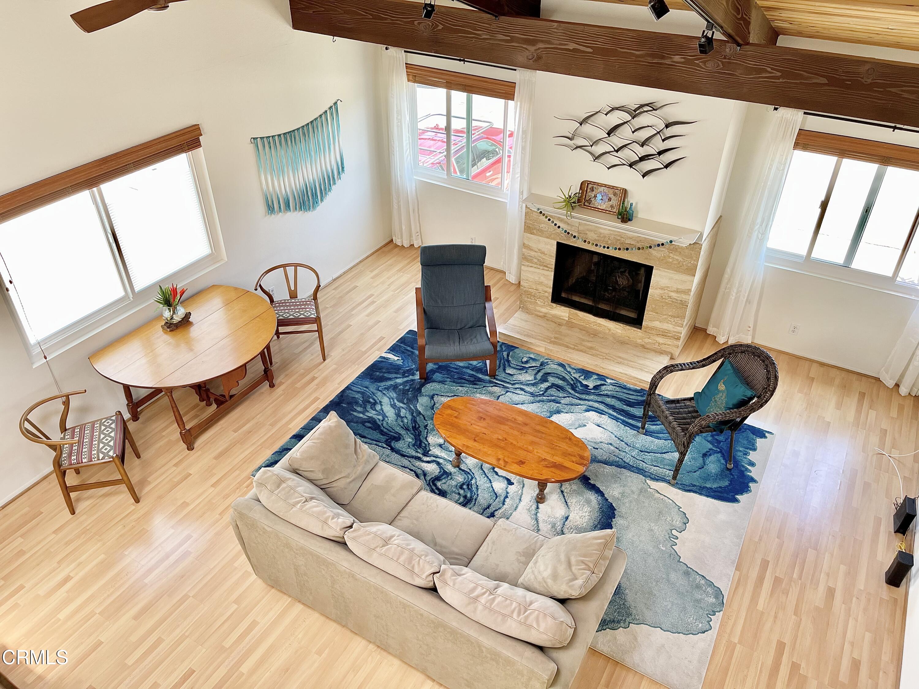 361 Rossmore Drive Oxnard, CA 93035 - Photo 8 of 26 a living room with furniture and a flat screen tv