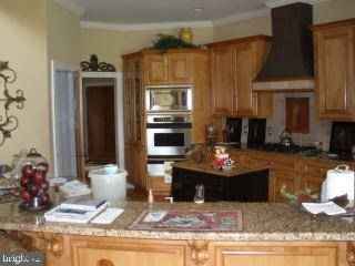 Lot #2 Rivermere Lane Eden, MD 21822 - Photo 6 of 11 a living room with stainless steel appliances kitchen island granite countertop a stove and a refrigerator