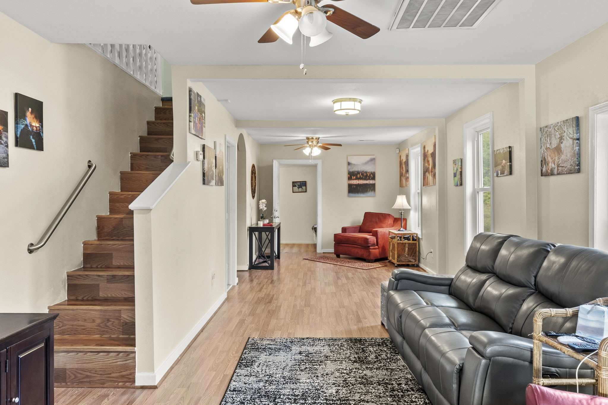 12498 Highway 69 Colmesneil, TX 75938 - Photo 14 of 50 a living room with furniture ceiling fan and a rug