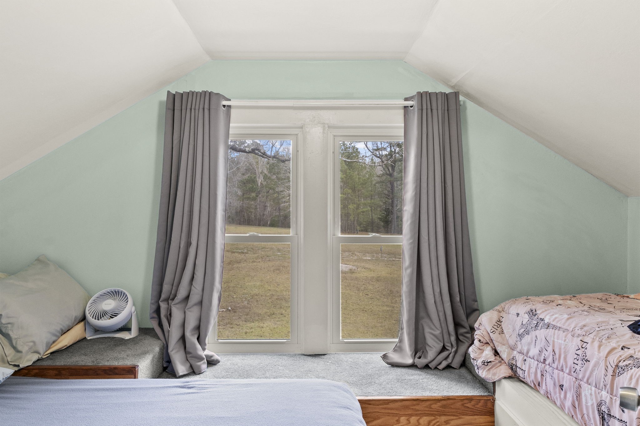 12498 Highway 69 Colmesneil, TX 75938 - Photo 22 of 50 a bedroom with a bed and a window