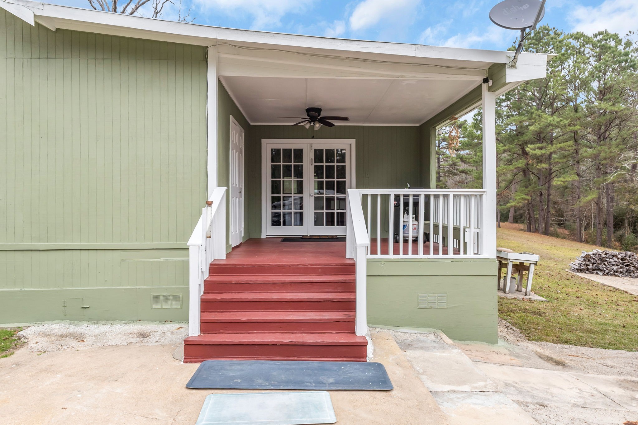 12498 Highway 69 Colmesneil, TX 75938 - Photo 23 of 50 a front view of a house with a yard