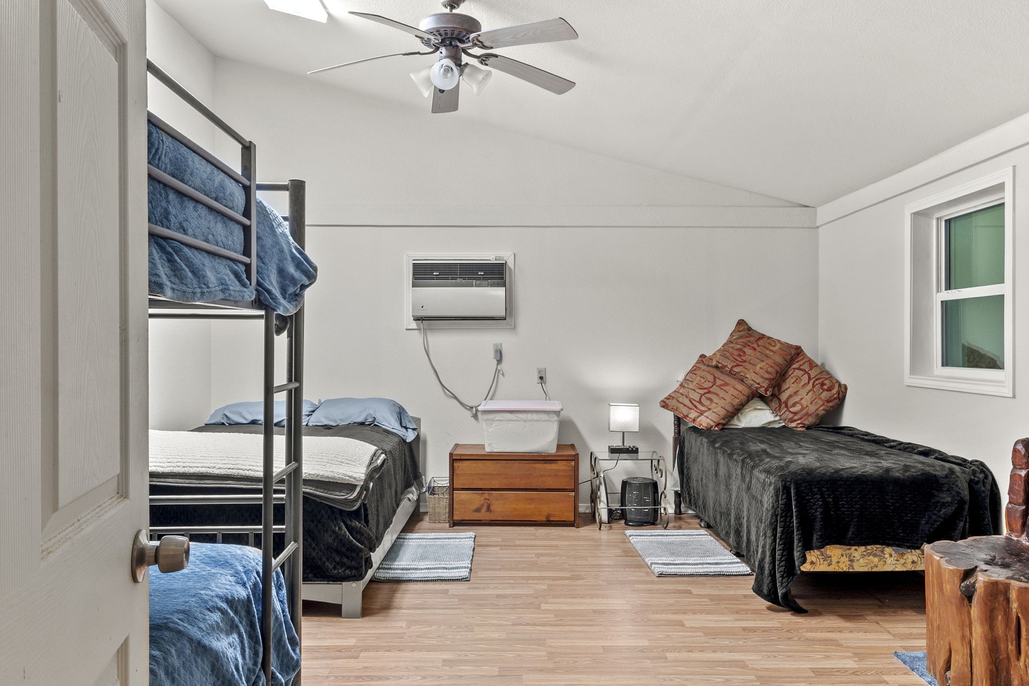 12498 Highway 69 Colmesneil, TX 75938 - Photo 26 of 50 a bedroom with furniture and a mirror