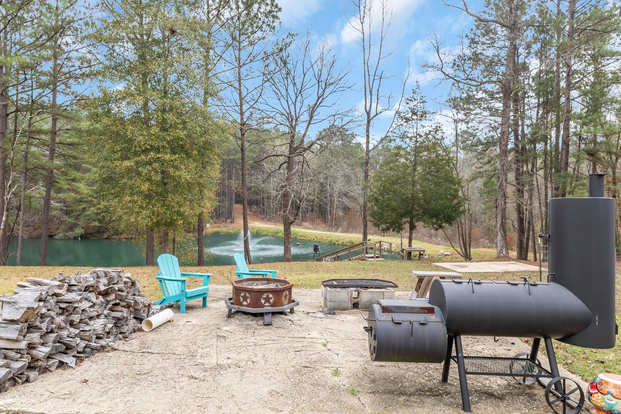 12498 Highway 69 Colmesneil, TX 75938 - Photo 33 of 50 a view of backyard with seating area and trees