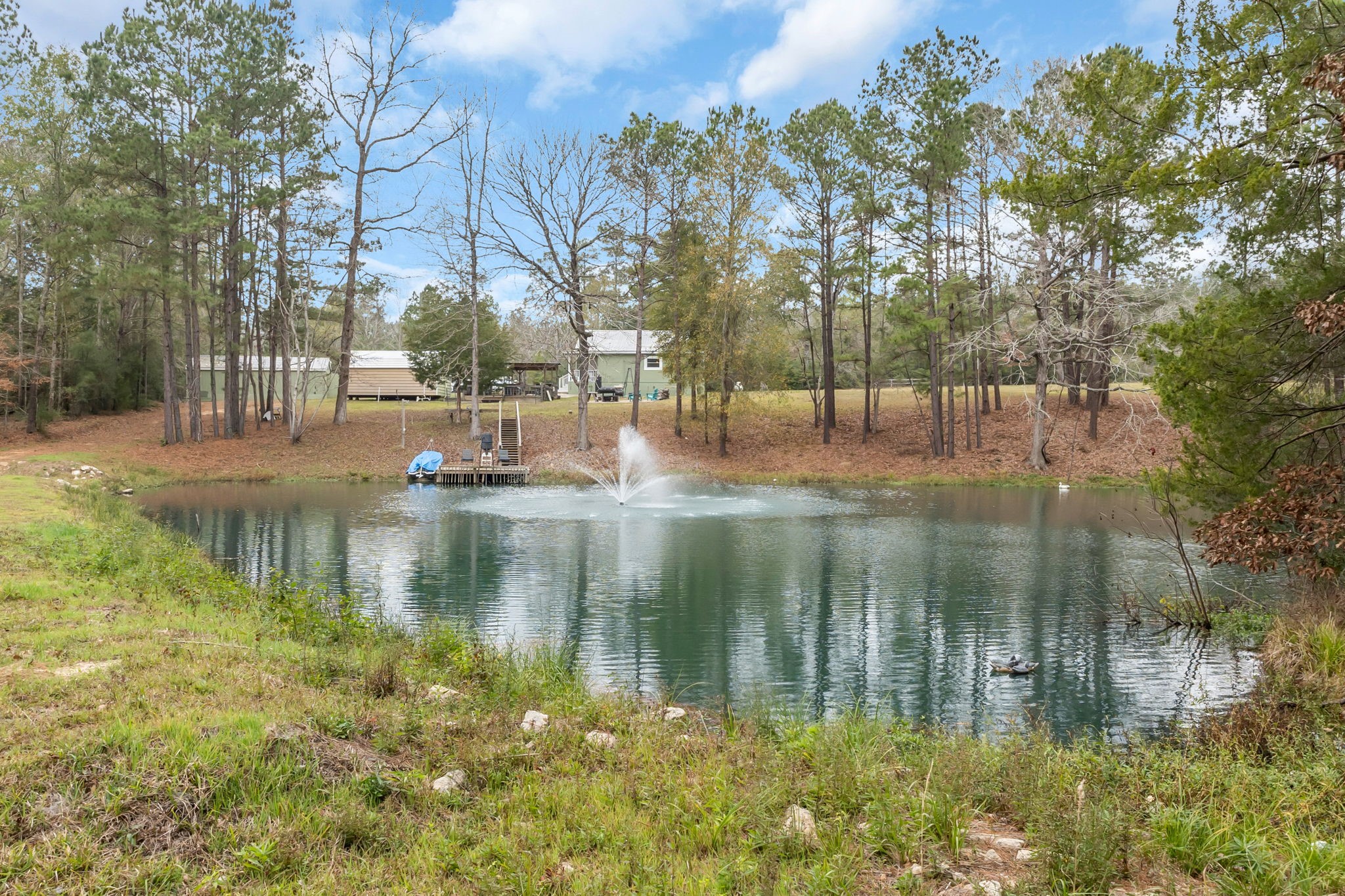 12498 Highway 69 Colmesneil, TX 75938 - Photo 35 of 50 a view of water with a building in the background