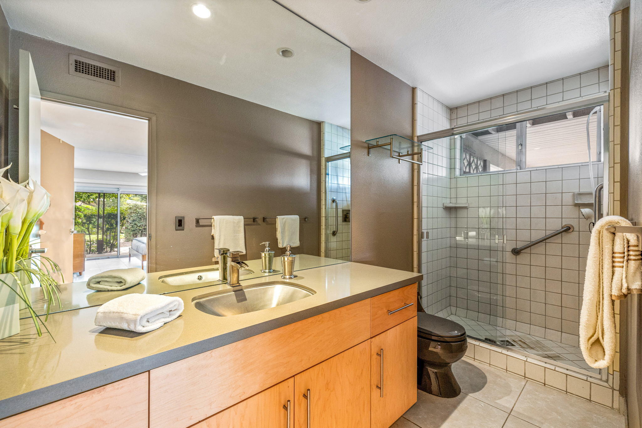 36851 Palm View Road Rancho Mirage, CA 92270 - Photo 18 of 29 a bathroom with a sink and a mirror