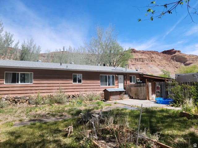 10429 4th Street East Randlett, UT 84063 - Photo 2 of 19 Single-story residence featuring horizontal plank siding and new double pane windows
