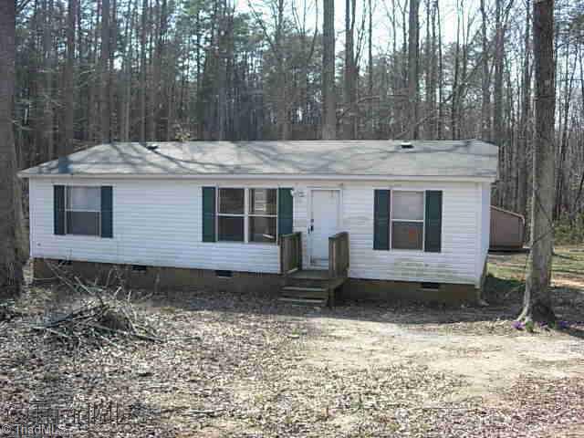 6919 Thacker Road Browns Summit, NC 27214 - Photo 1 of 9 Exterior Front.