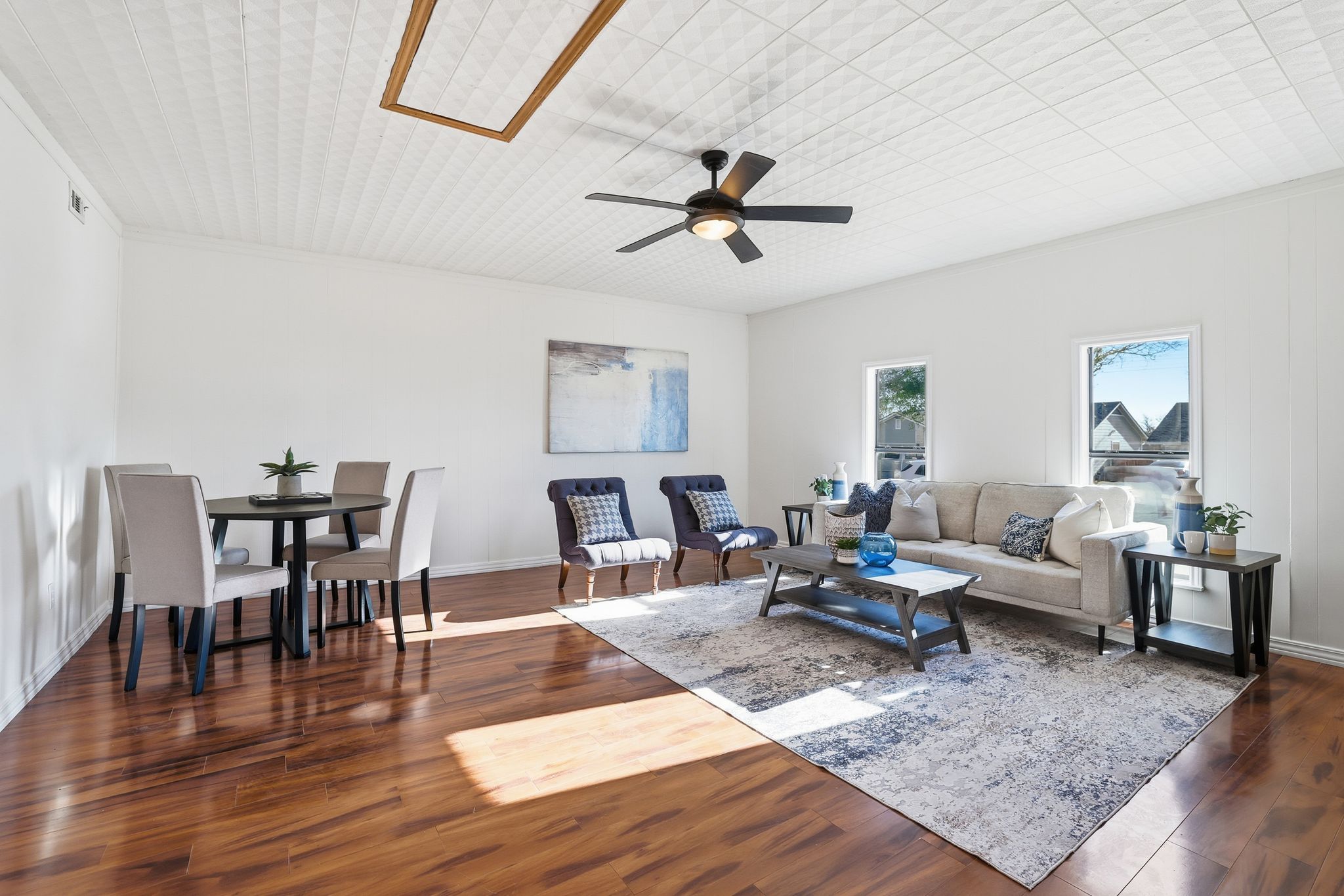 13004 Esplanade Street Austin, TX 78727 - Photo 29 of 36 Second living room/game room featuring dark wood finished floors and ceiling fan