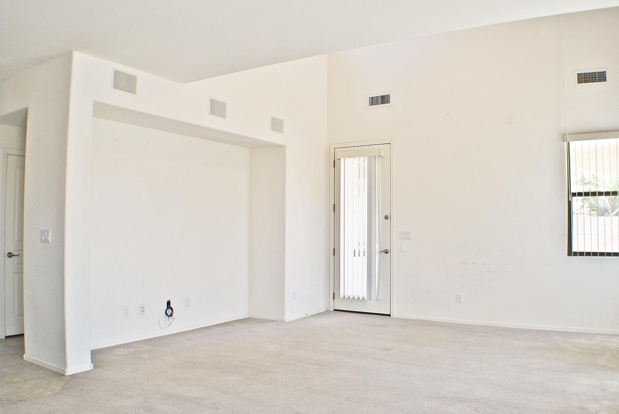 21383 East Alyssa Road Queen Creek, AZ 85142 - Photo 4 of 18 Huge entertainment area for largest TV!
