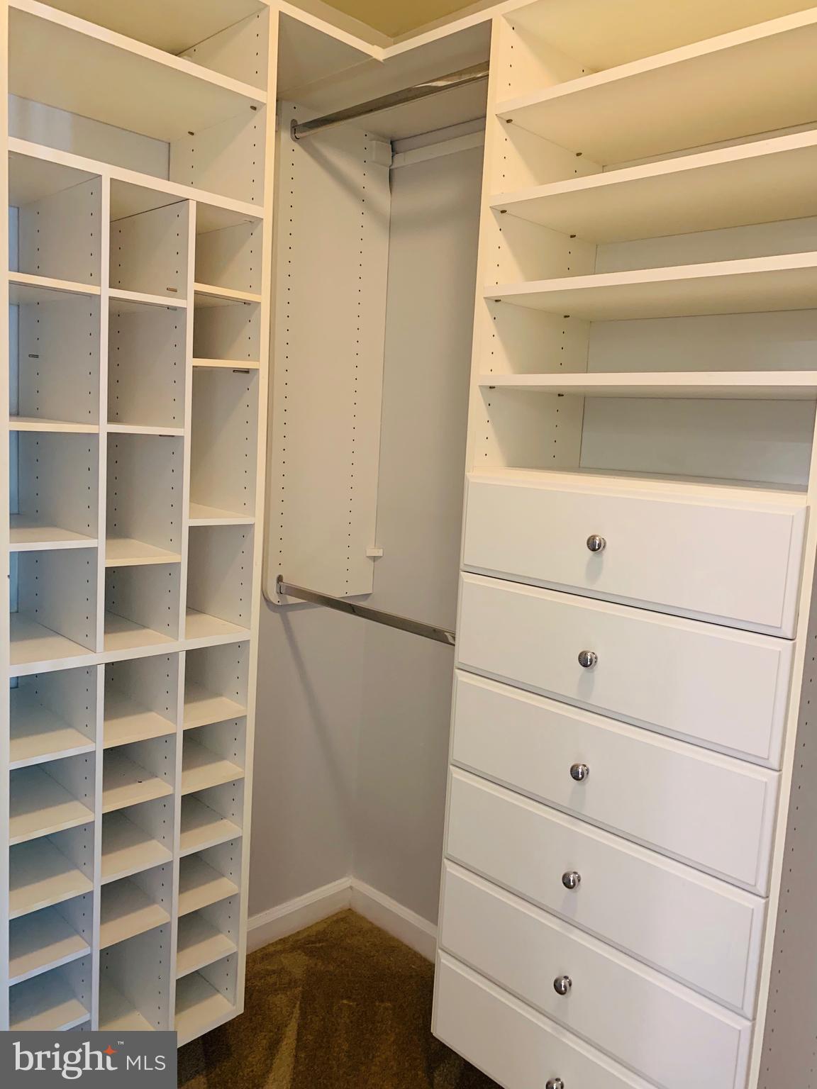 6832 Hayley Ridge Way, Unit G Baltimore, MD 21209 - Photo 19 of 34 Walk-in California Closet in Master Bedroom