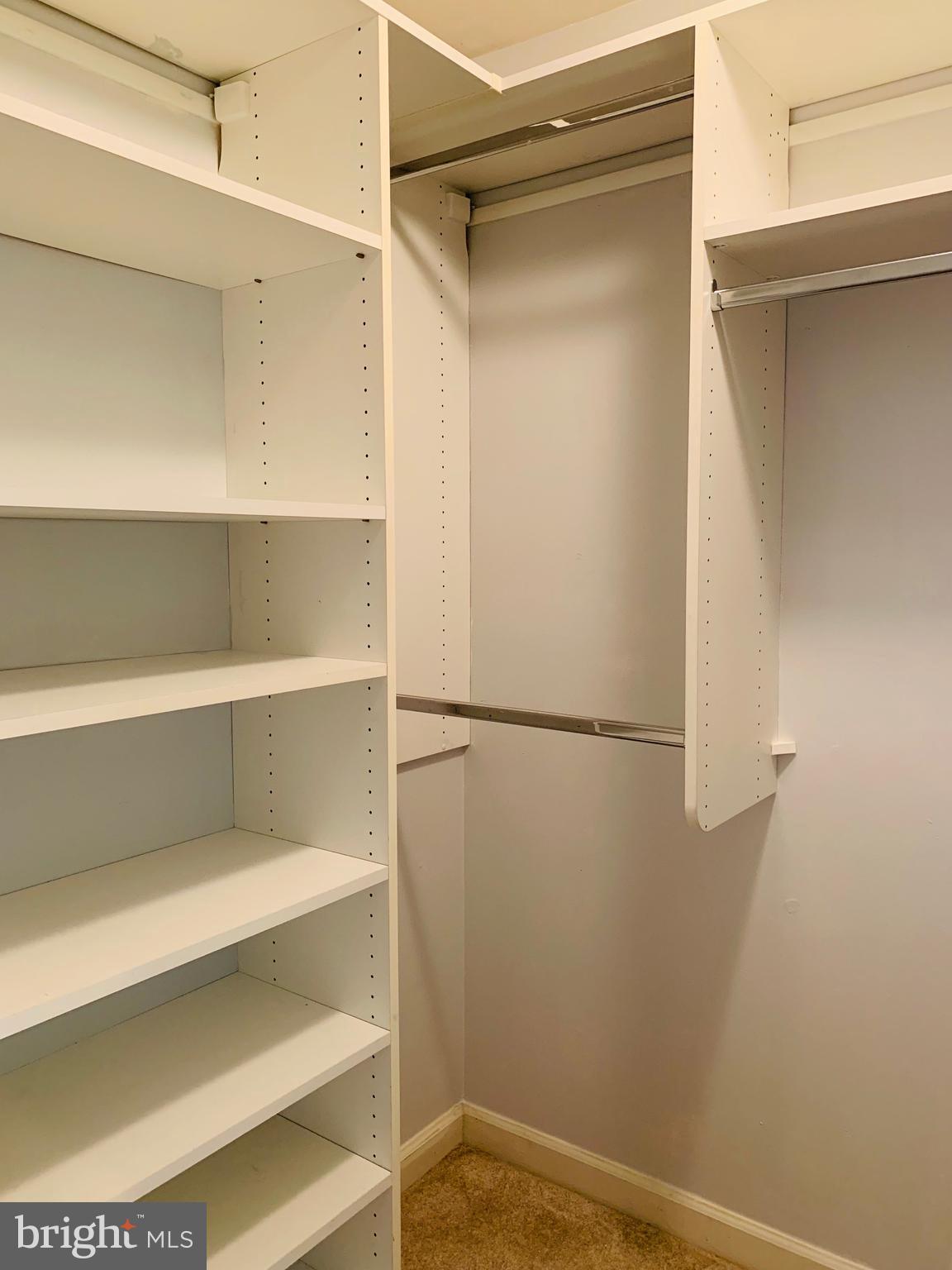 6832 Hayley Ridge Way, Unit G Baltimore, MD 21209 - Photo 20 of 34 Walk-in California Closet in Master Bedroom