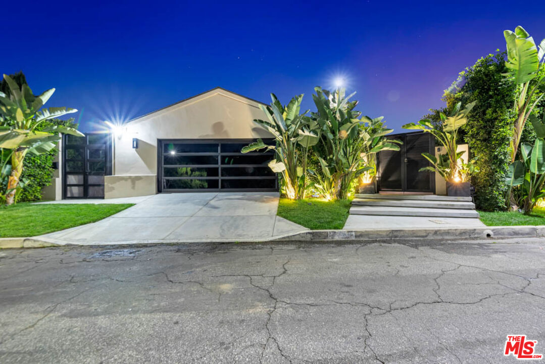 2990 Lakeridge Drive Los Angeles, CA 90068 - Photo 49 of 53 a view of a house with a yard and potted plants