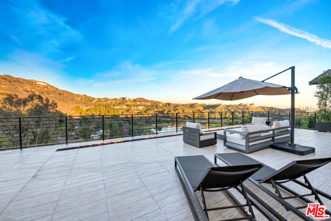 2990 Lakeridge Drive Los Angeles, CA 90068 - Photo 6 of 53 a view of roof deck with couches and potted plants