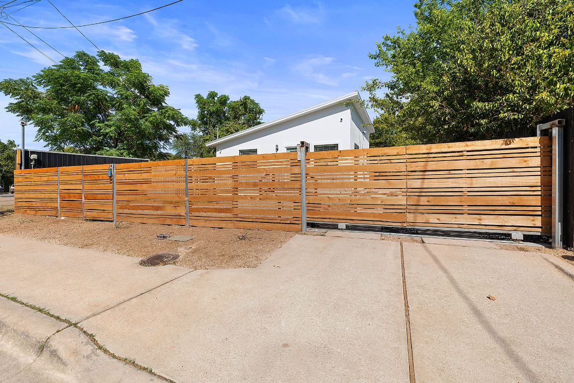 1171 Nickols Avenue, Unit 1 Austin, TX 78721 - Photo 4 of 22 Gate featuring a patio