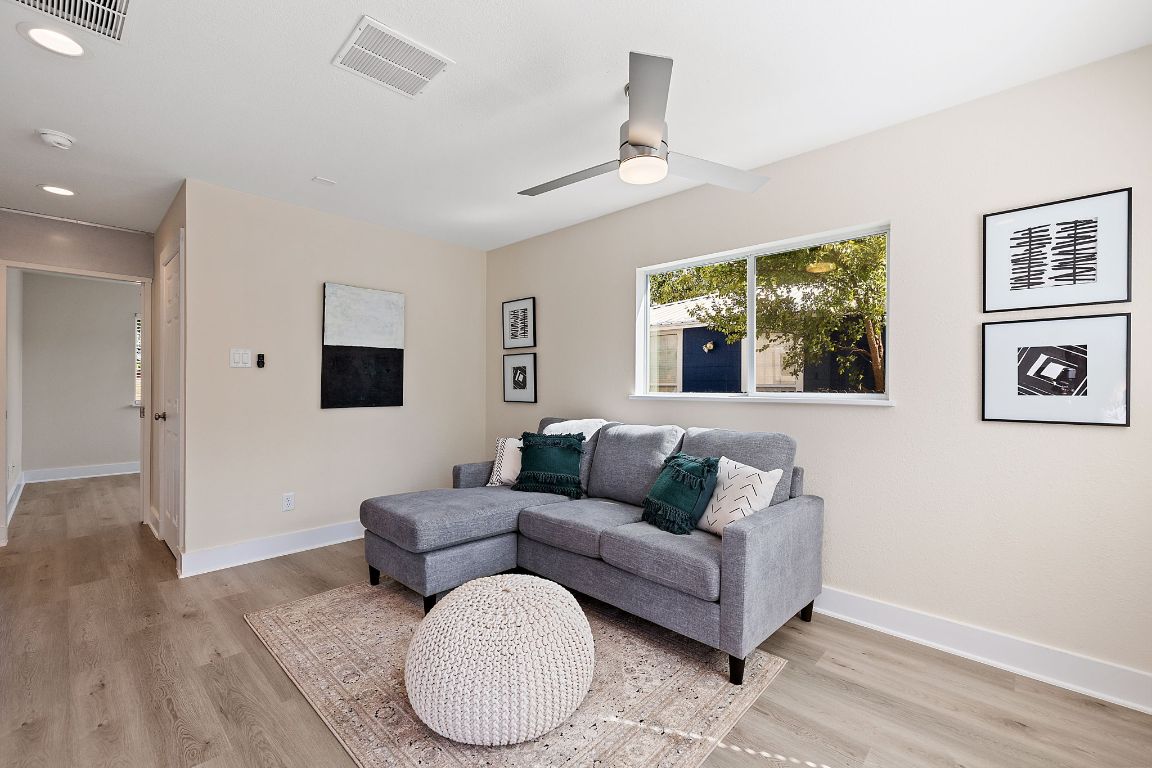 1171 Nickols Avenue, Unit 1 Austin, TX 78721 - Photo 5 of 22 Living area featuring ceiling fan, light wood-style flooring, and recessed lighting