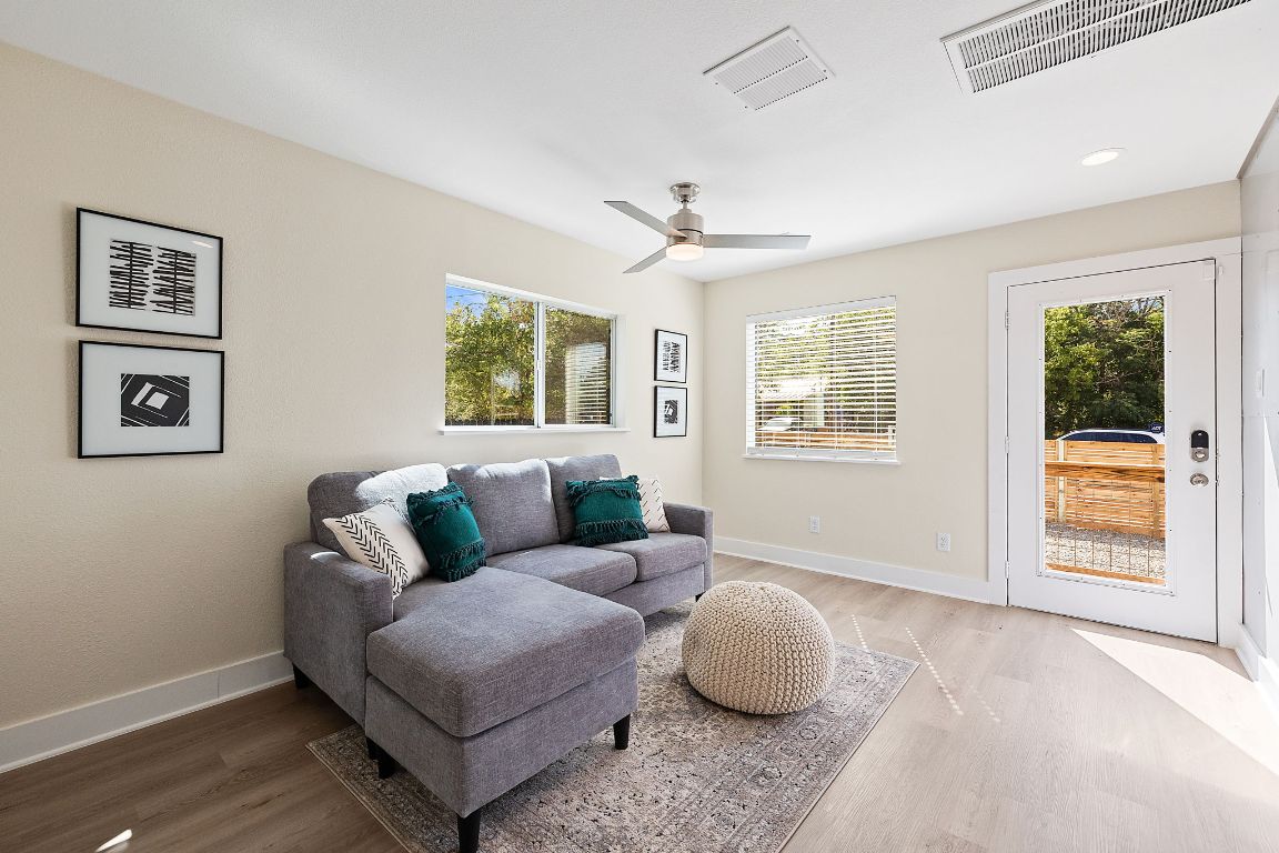 1171 Nickols Avenue, Unit 1 Austin, TX 78721 - Photo 7 of 22 Living room featuring wood finished floors, ceiling fan, and recessed lighting