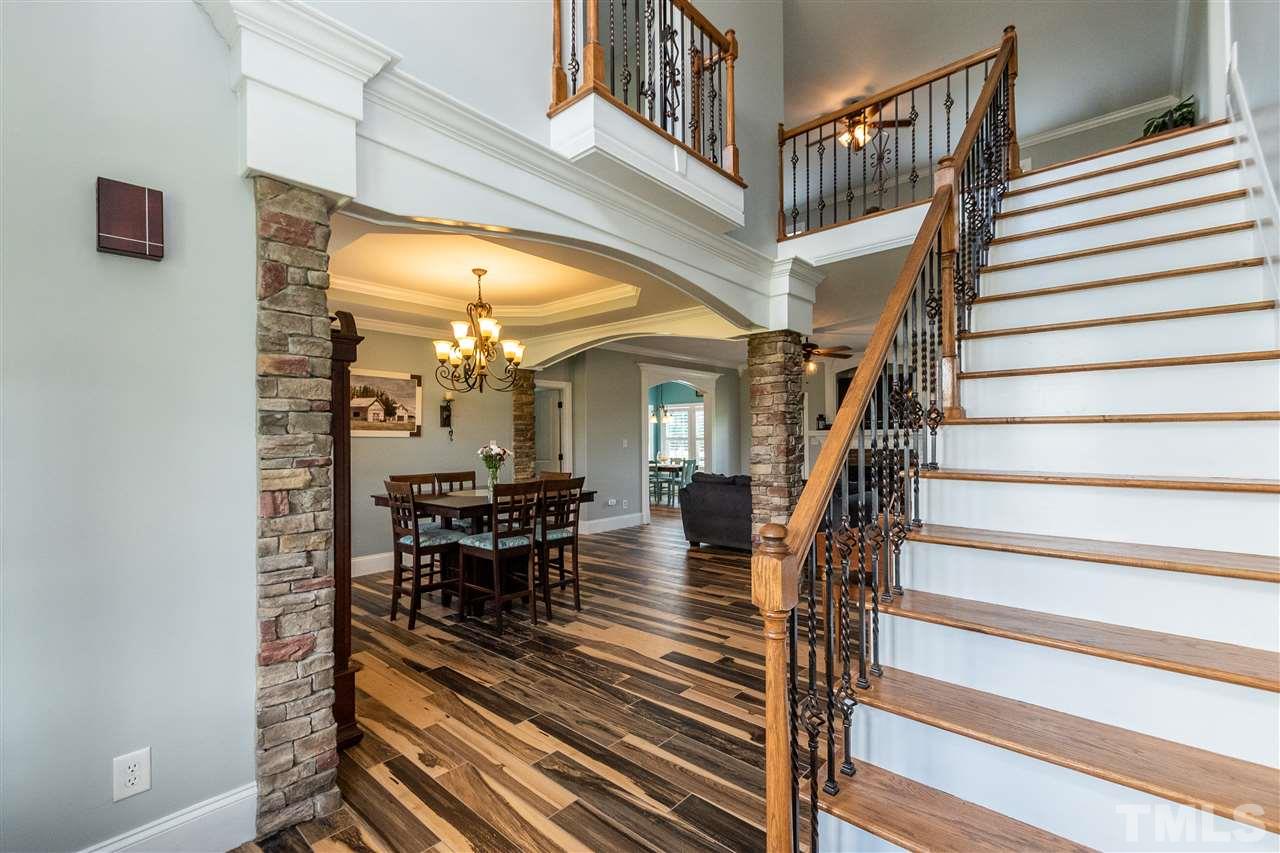 496 Janie Road Selma, NC 27576 - Photo 3 of 30 Natural Light Galore, from two giant custom doors and window above.