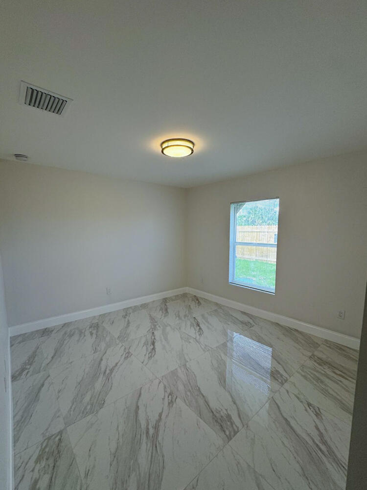6465 Alexander Road West Palm Beach, FL 33413 - Photo 13 of 20 a view of an empty room