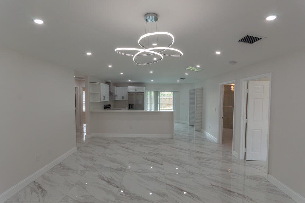 6465 Alexander Road West Palm Beach, FL 33413 - Photo 6 of 20 a view of kitchen and windows