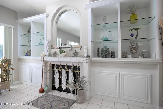 a view of wooden floor and windows