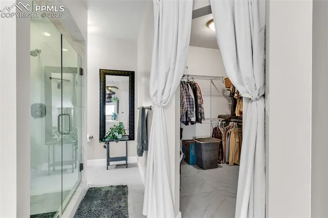 a view of a hallway and a living room