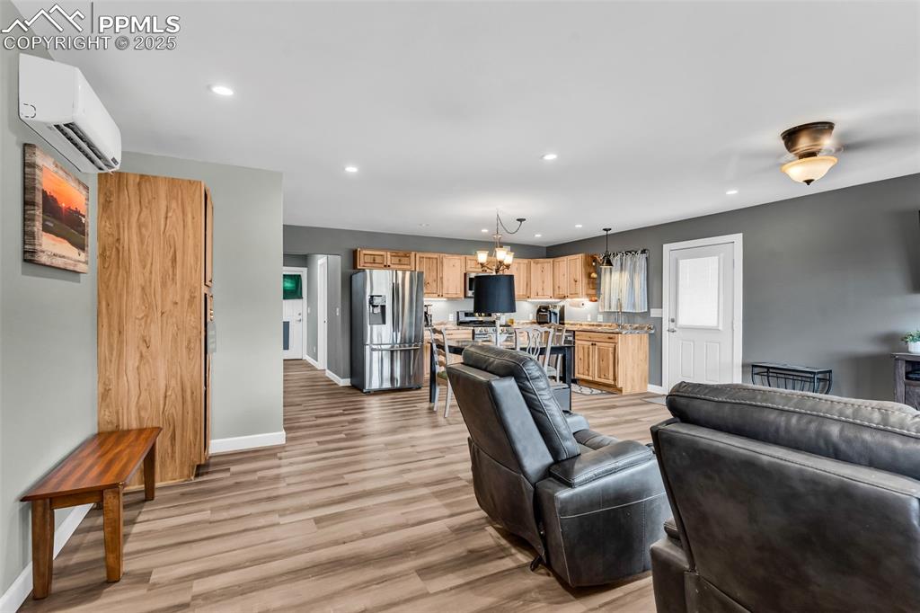 10380 Coyote Lane Rye, CO 81069 - Photo 36 of 50 a living room with furniture and a wooden floor