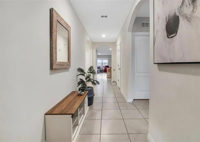 a view of a entryway with furniture and wooden floor