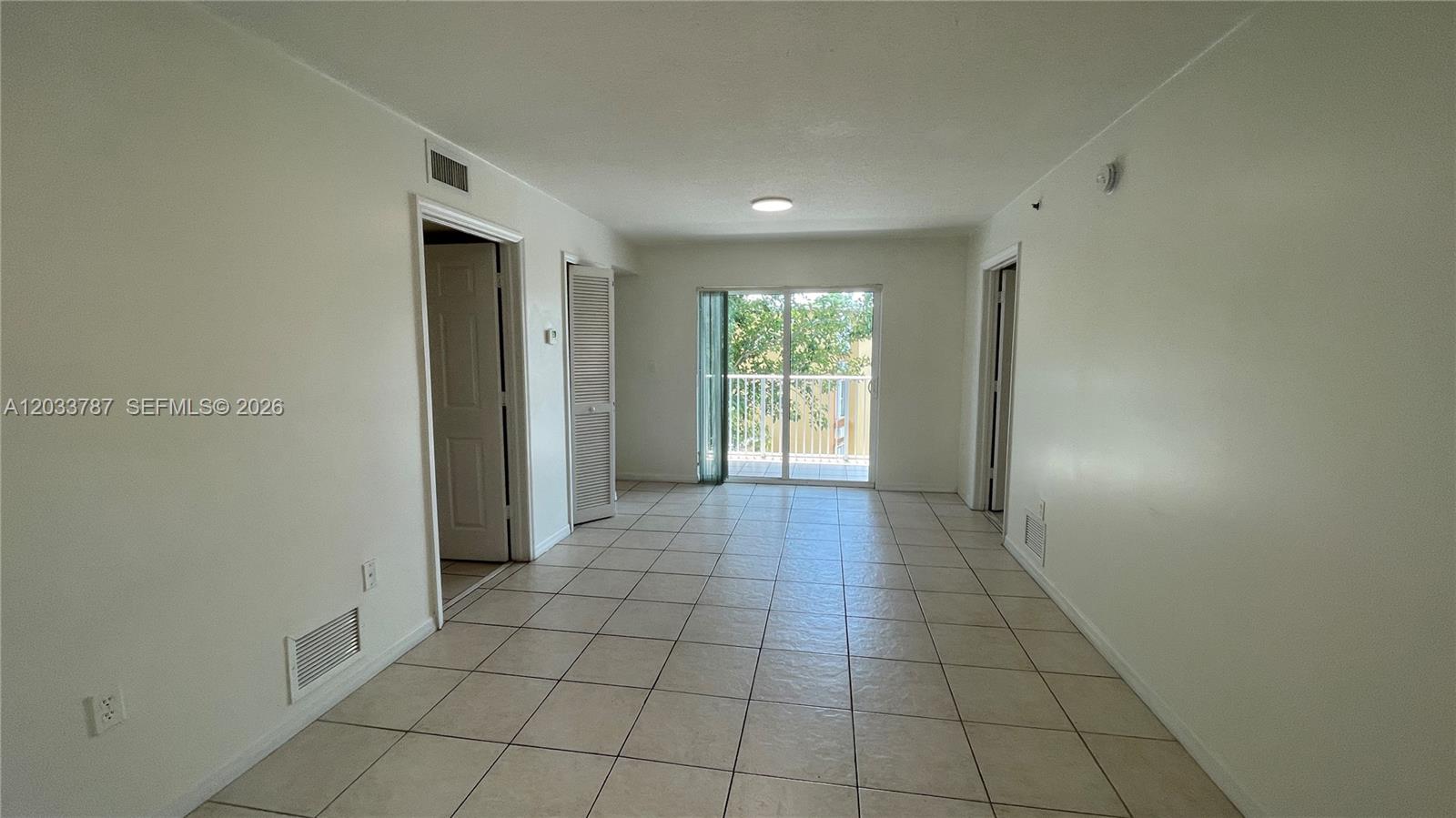 2475 Northwest 16th St Road, Unit 309 Miami, FL 33125 - Photo 3 of 16 Living-Dining area