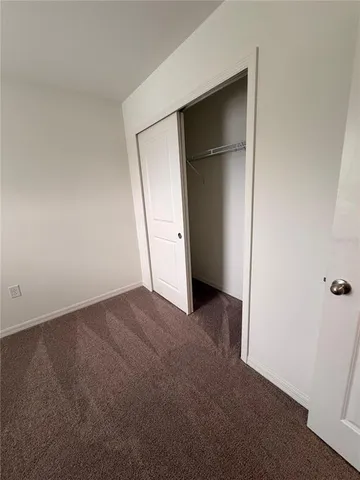 an empty room with closet