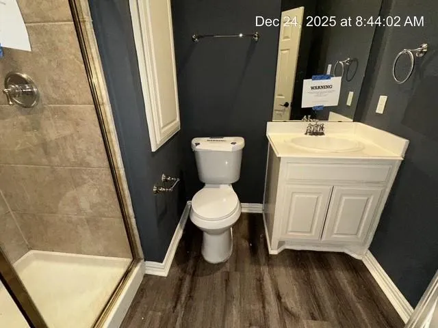 a bathroom with a toilet and a sink