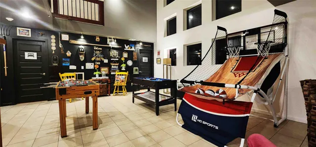 a view of an chairs and tables in the patio